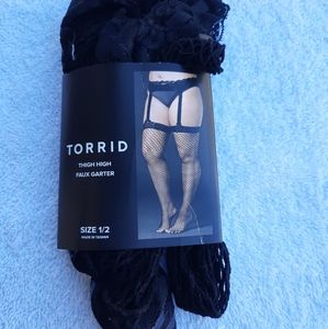 Torrid thigh high fishnet garter